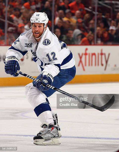 Ryan Malone of the Tampa Bay Lightning skates against the Philadelphia Flyers on February 5, 2013 at the Wells Fargo Center in Philadelphia,...