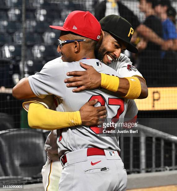Joshua Palacios of the Pittsburgh Pirates hugs his brother Richie Palacios of the St. Louis Cardinals following the game at PNC Park on August 21,...