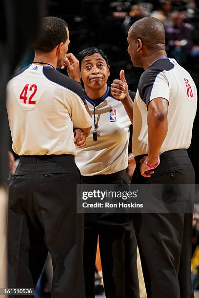 Referees, from left, Eric Lewis, Violet Palmer and Sean Wright speak during a game between the Brooklyn Nets and Indiana Pacers on February 11, 2013...