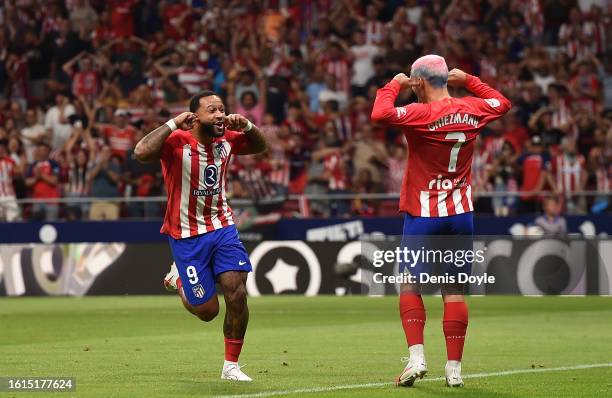 Memphis Depay of Atletico de Madrid celebrates after scoring their team's second goal during the LaLiga EA Sports match between Atletico Madrid and...