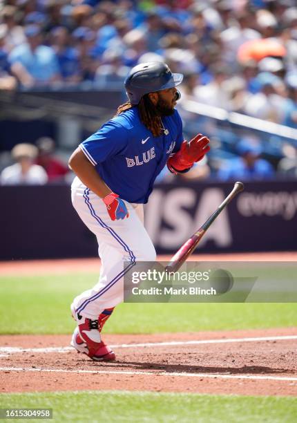 Vladimir Guerrero Jr. #27 of Toronto Blue Jays hits a RBI single against the Chicago Cubs during the fourth inning in their MLB game at the Rogers...