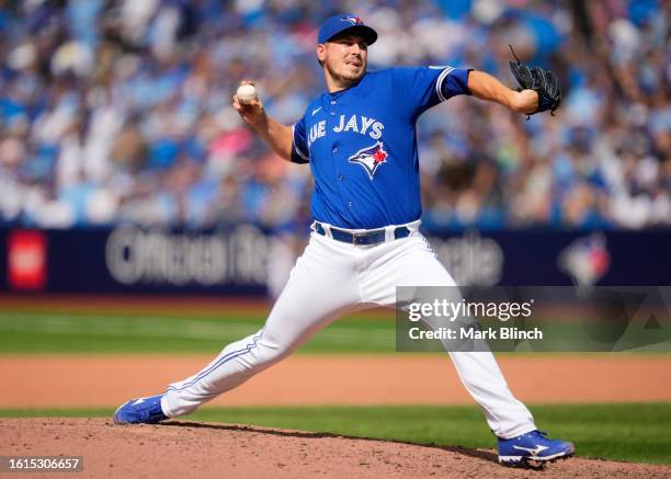 Erik Swanson of Toronto Blue Jays pitches to the Chicago Cubs during the eighth inning in their MLB game at the Rogers Centre on August 13, 2023 in...