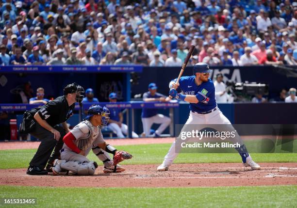 Danny Jansen of Toronto Blue Jays takes an at bat against the Chicago Cubs during the fourth inning in their MLB game at the Rogers Centre on August...