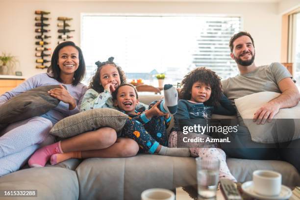81,308 Family Sitting On A Sofa Stock Photos, High-Res Pictures, and ...