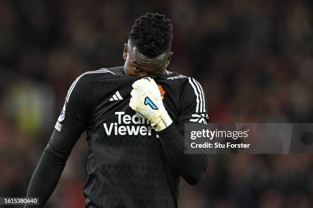 Manchester United goalkeeper Andre Onana reacts during the Premier League match between Manchester United and Wolverhampton Wanderers at Old Trafford...