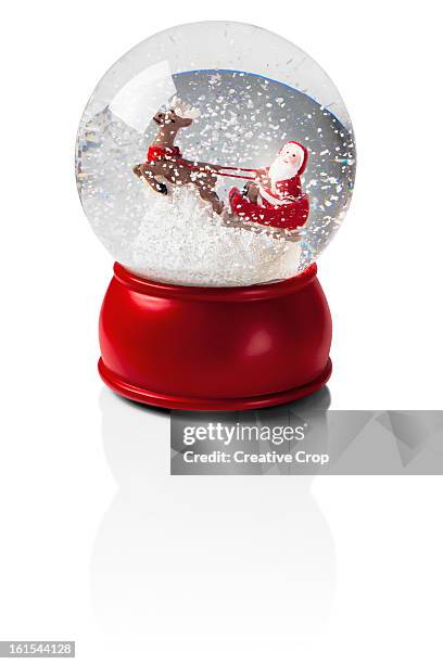 snow globe with santa and his sleigh - empty snow globe stock pictures, royalty-free photos & images