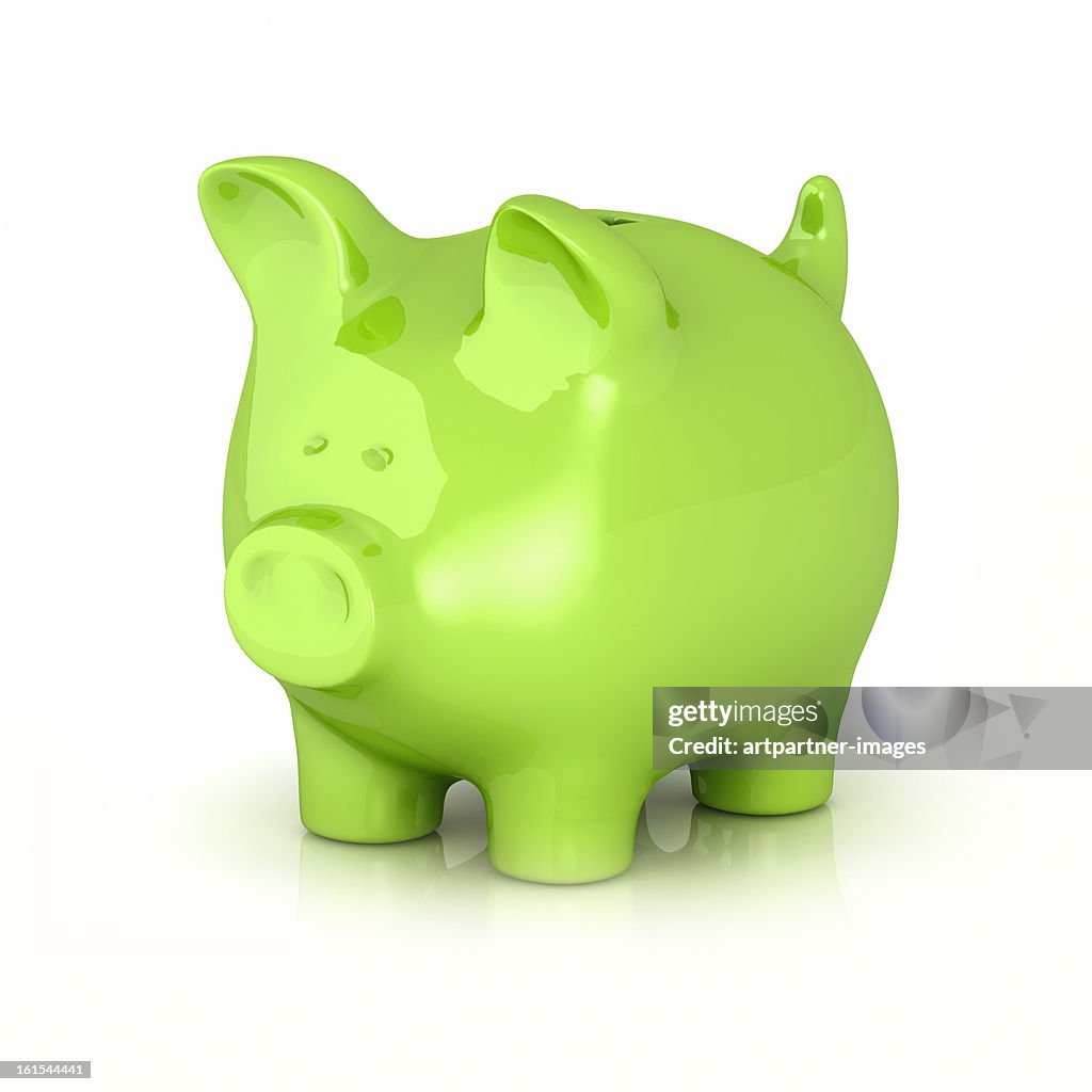 Green piggy bank on a white background
