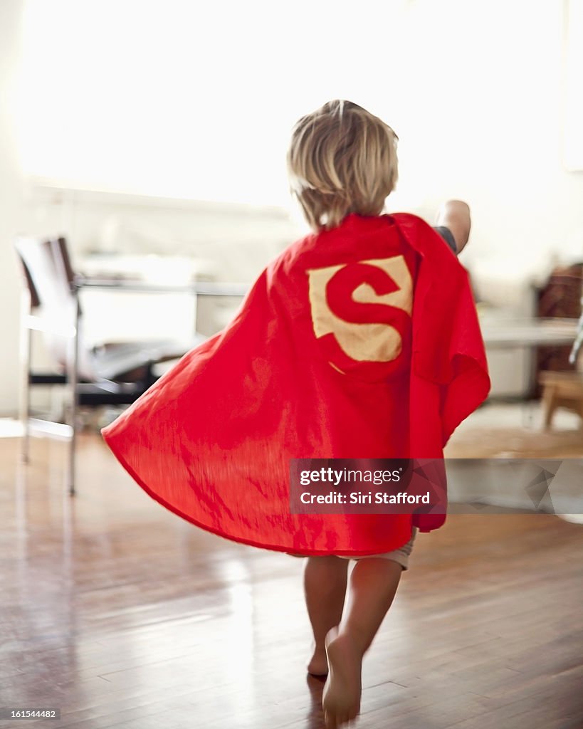 Young boy with homemade cape