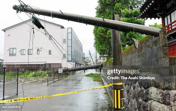 An electric poll is broken as Typhoon Lan makes a landfall on August 15, 2023 in Owase, Mie, Japan. The Typhoon halt parts of Japan's main...