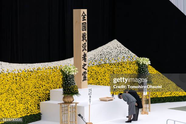 Japan's Emperor Naruhito and Empress Masako bow at the altar during the National Memorial Service for War Dead on August 15, 2023 in Tokyo, Japan....