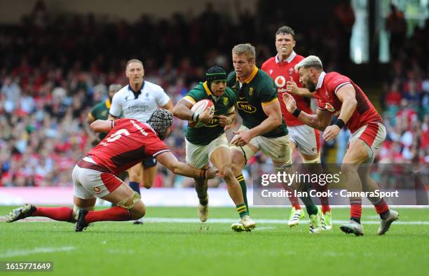 South Africa's Cheslin Kolbe is tackled by Wales's Dan Lydiate during the Summer International match between Wales and South Africa at Principality...