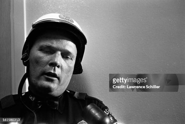 Portrait of an unidentified motorcycle police officer who had ridden in President John F. Kennedy's motorcade at the time of his assassination,...