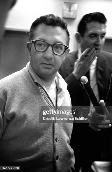 Earl Ruby Earl Ruby talks with the press shortly after the death of... News Photo ...