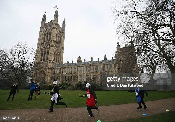 The annual Parliamentary Pancake Race takes place in front of the Houses of Parliament on Shrove Tuesday on February 12, 2013 in London, England. Now...