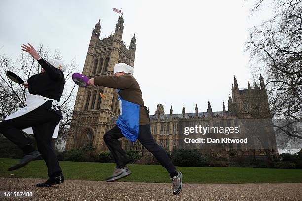 The annual Parliamentary Pancake Race takes place in front of the Houses of Parliament on Shrove Tuesday on February 12, 2013 in London, England. Now...