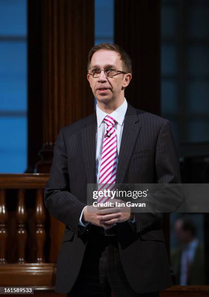 Jim Sadler of Xchanging demonstrates the new iPad application at Lloyd's of London on February 12, 2013 in London, England. The application allows...