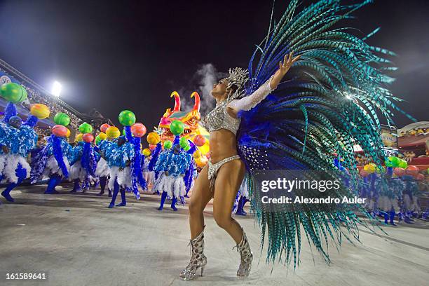 Members of Unidos de Vila Isabel dance during Carnival 2013 at Sambodrome Marques da Sapucai on February 12, 2013 in Rio de Janeiro, Brazil.