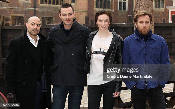 Stanley Tucci, Nicholas Hoult, Eleanor Tomlinson and Ewan McGregor attend a photocall for 'Jack The Giant Slayer' at Hampton Court Palace on February...