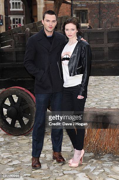 Nicholas Hoult and Eleanor Tomlinson attend a photocall for 'Jack The Giant Slayer' at Hampton Court Palace on February 12, 2013 in London, England.