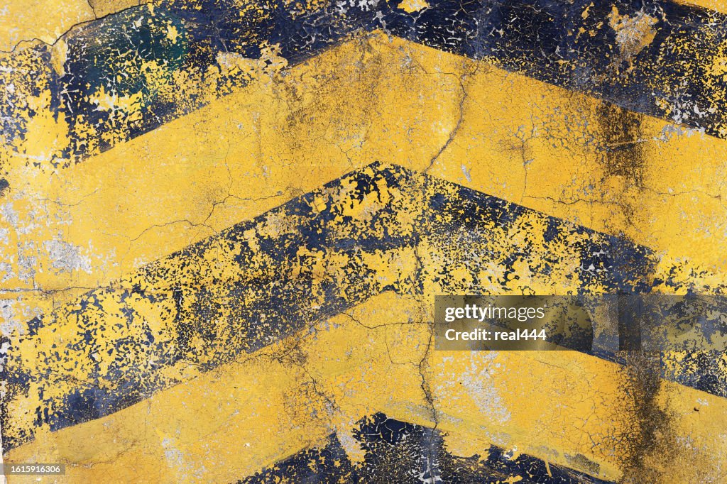 Grunge gelbe und schwarze diagonale Streifen