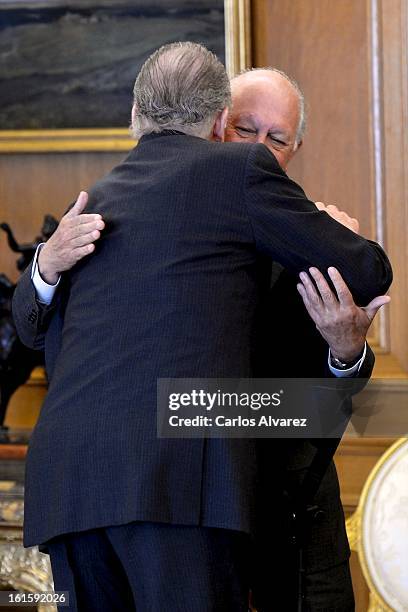 King Juan Carlos of Spain receives former Chilean President Ricardo Lagos at Zarzuela Palace on February 12, 2013 in Madrid, Spain.