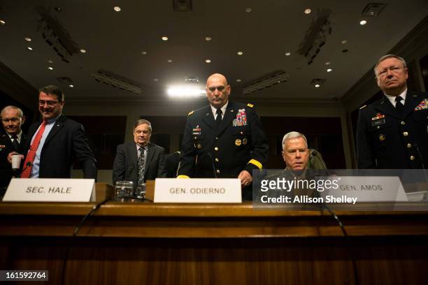 Defense department officials Joint Chiefs of Staff Chairman Gen. Martin Dempsey, Deputy Defense Secretary Ashton Carter, Defense Undersecretary...