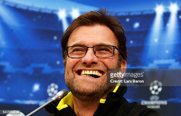 Head coach Juergen Klopp smiles during a Borussia Dortmund press conference ahead of their UEFA Champions League round of 16 match against Shakhtar...