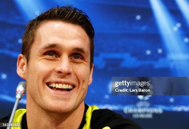Sebastian Kehl smiles during a Borussia Dortmund press conference ahead of their UEFA Champions League round of 16 match against Shakhtar Donetsk at...