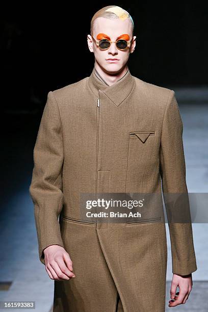 Model walks the runway at the Siki Im fashion show during Fall 2013 Mercedes-Benz Fashion Week at Cafe Rouge on February 12, 2013 in New York City.