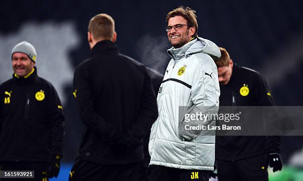 Head coach Juergen Klopp smiles during a Borussia Dortmund training session ahead of their UEFA Champions League round of 16 match against Shakhtar...