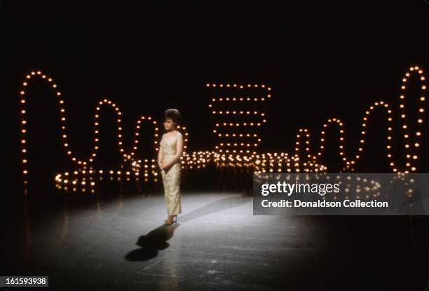 Pop and country singer Brenda Lee performs on the NBC TV music show 'Hullabaloo' in May 1965 in New York City, New York.