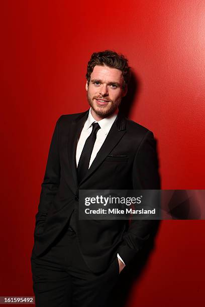 Richard Madden poses in the portrait studio at the Pre-Bafta party hosted by EE and Esquire ahead of the 2013 EE British Academy Film Awards at The...