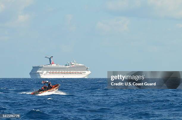 In this handout from the U.S. Coast Guard, the cruise ship Carnival Triumph sits idle February 11, 2013 in the Gulf of Mexico. According to the Coast...