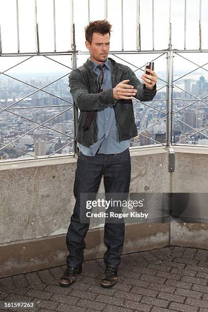 Josh Duhamel takes a self portrait at The Empire State Building on February 12, 2013 in New York City.