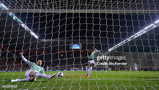 Kelvin Wilson of Celtic fails to keep out the first goal scored by Alessandro Matri of Juventus during the UEFA Champions League Round of 16 first...