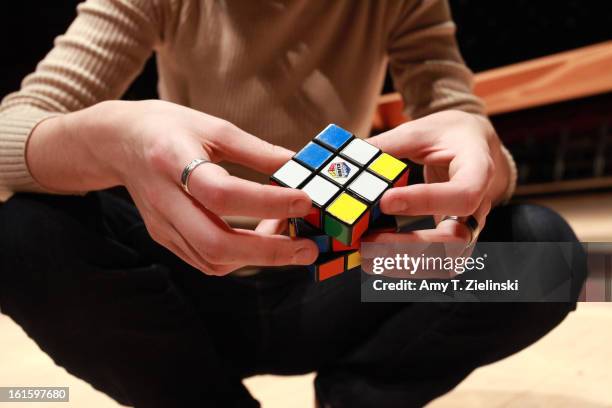 German-Japanese concert pianist Alice Sara Ott demonstrates using her Rubik's Cube to warm up her fingers after rehearsing on stage piano works by...