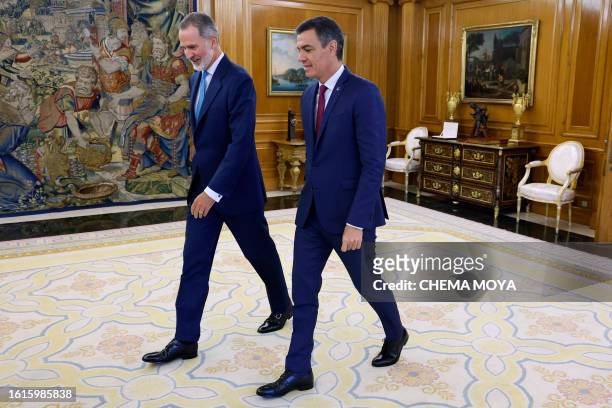 Spain's King Felipe VI receives Spain's acting Prime Minister Pedro Sanchez as part of the round of consultations with political representatives...
