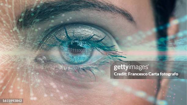 human eye with using the futuristic technology - iris scan stock pictures, royalty-free photos & images