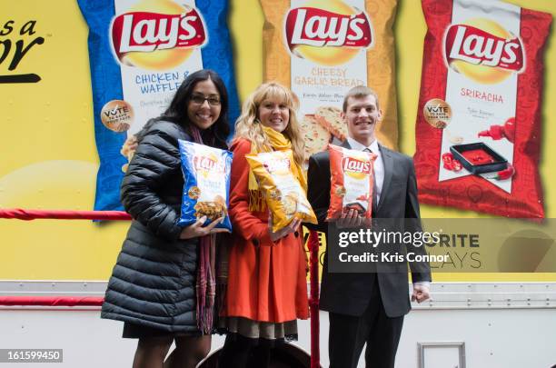 Christina Abu-Judom, Karen Weber-Mendham and Tyler Raineri pose for a photo during NYSE Celebrates Lay's "Do Us a Flavor" Contest Finalists during...