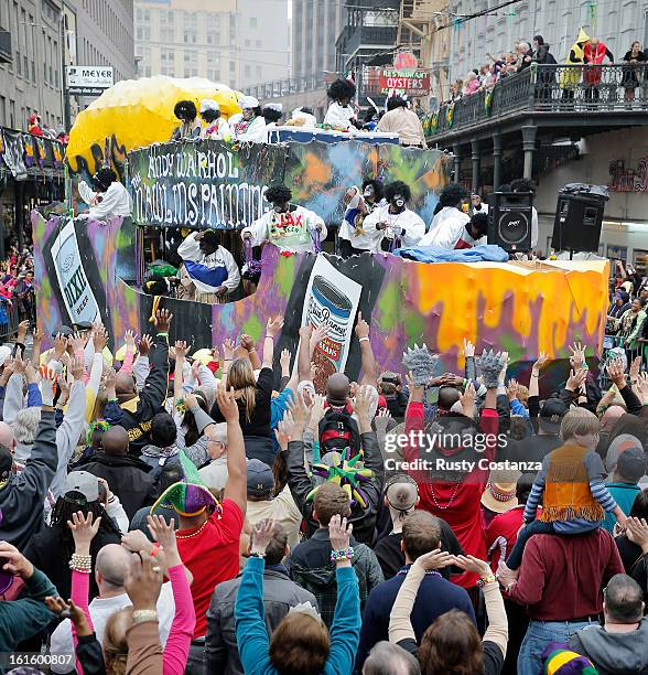 Float in the Krewe of Zulu parade turns on to Canal Street to large crowds with out outstretched arms on Mardi Gras Day. Fat Tuesday, the traditional...