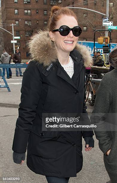 Actress Julianne Moore attends Fall 2013 Mercedes-Benz Fashion Show at The Theater at Lincoln Center on February 12, 2013 in New York City.