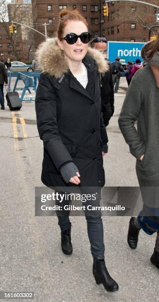 Actress Julianne Moore attends Fall 2013 Mercedes-Benz Fashion Show at The Theater at Lincoln Center on February 12, 2013 in New York City.