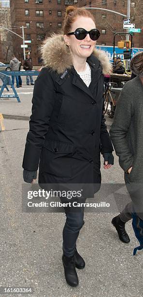 Actress Julianne Moore attends Fall 2013 Mercedes-Benz Fashion Show at The Theater at Lincoln Center on February 12, 2013 in New York City.