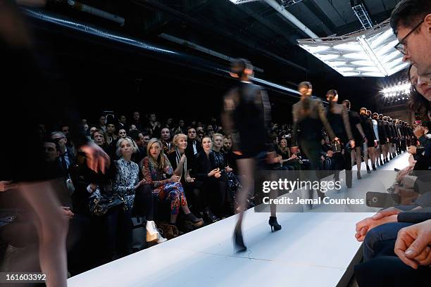 Models walk the runway at the Diesel Black Gold Fall 2013 fashion show during Mercedes-Benz Fashion Week at Pier 57 on February 12, 2013 in New York...