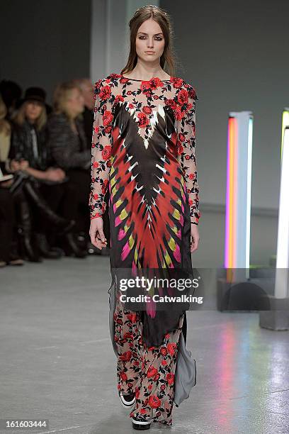 Model walks the runway at the Rodarte Autumn Winter 2013 fashion show during New York Fashion Week on February 12, 2013 in New York, United States.