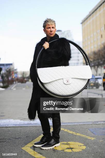 Kyle Anderson seen outside the Diesel Black Gold show wearing Michael Kors fur, Chanel bag and Burberry shoes and Micha at Streets of Manhattan on...