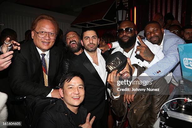 Noel Lee, Mr. Brainwash, Sam Keywanfar, Rick Ross, DJ Irie, Swizz Beatz and Kevin Lee attend House Of Hype Monster Grammy Party at House Of Hype on...