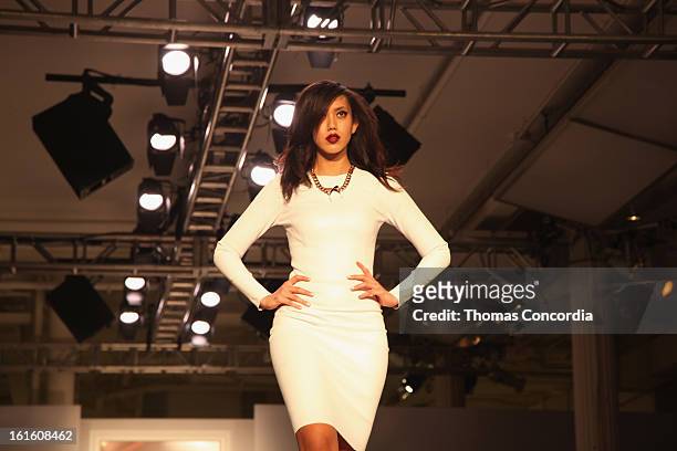Model walks the runway during the FrontRow By Shateria Moragne-el Fashion Show at STYLE360 presented by Conair Fashion Pavilion on February 12, 2013...