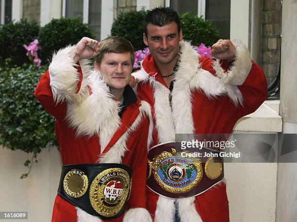 Ricky Hatton and Joe Calzaghe dress up as Santa Claus to announce their forthcoming joint top of the bill promotion fight during a press conference...