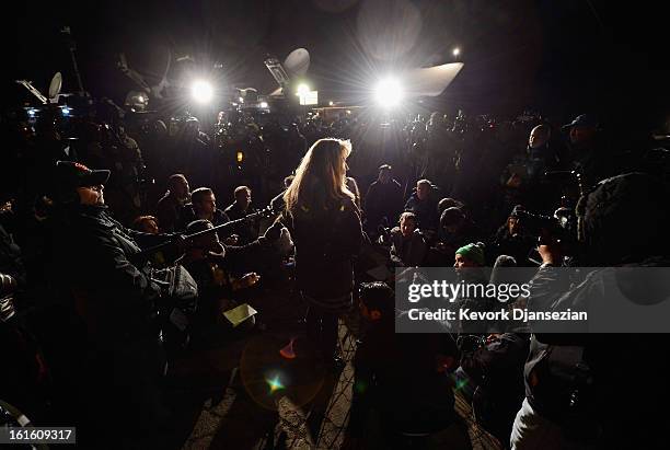 Cindy Bachman, public information officer for the San Bernardino Sheriff's Department, updates the media after a standoff and a shootout with former...